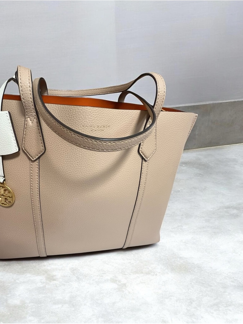 Tory Burch Pebbled Beige Tote with Orange Interior Trim